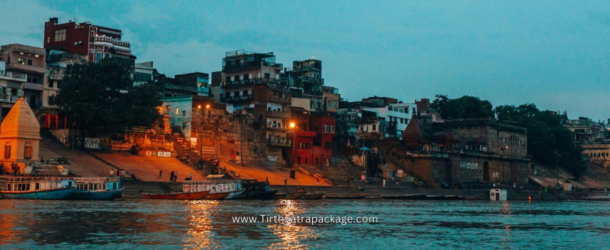 Varanasi Tour Package - Varanasi Tour - ganaga river with boat and buildings - this post is for my website tirthyatrapackage